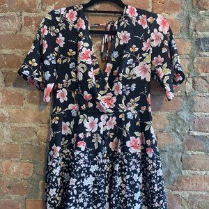 Medium Francesca's Pink Floral Print Black Romper